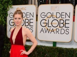 Stars strut on soggy Globes red carpet