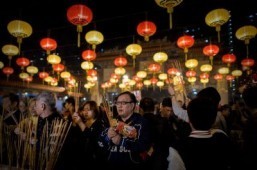Asia rings in Year of the Horse with fireworks, festivities