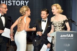 US actress Sharon Stone speaks on stage on May 23, 2013 with US actor Jeremy Renner (C) and Australian actress Nicole Kidman during the amfAR's 20th Annual Cinema Against AIDS during the 66th Annual Cannes Film Festival at Hotel du Cap-Eden-Roc in Cap d'Antibes, southern France. ©AFP PHOTO / ALBERTO PIZZOLI