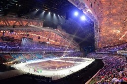 The national delegations parade during the Opening Ceremony of the Sochi Winter Olympics at the Fisht Olympic Stadium on February 7, 2014 in Sochi. ©AFP PHOTO / DAMIEN MEYER
