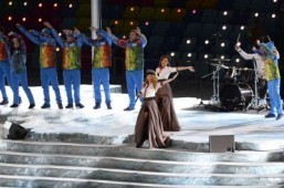 Yulia Volkova (C-top) and Lena Katina (C-bottom) of t.A.T.u. perform during the Opening Ceremony of the Sochi Winter Olympics at the Fisht Olympic Stadium on February 7, 2014 in Sochi. ©AFP PHOTO / JONATHAN NACKSTRAND
