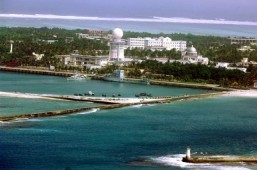 China to open disputed islands to tourism: official