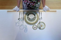 This undated picture released by Institute Sarita shows its founder Sarah Jane Ho teaching table manners in Beijing. How to properly peel an orange, hold an oyster fork, and pronounce luxury brand names -- wealthy Chinese are paying handsome sums to learn such skills as they seek to match their high-end lifestyles with high-class etiquette. ©AFP PHOTO / INSTITUTE SARITA