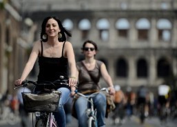 Crisis-hit Italians swap cars for bikes despite perils