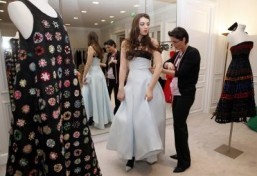 Kyra Kennedy, great niece of late President John F. Kennedy and daughter of Robert Kennedy Jr, gets a dress fitted at Dior in Paris on November 27, 2013, ahead of the Debutante Ball. "Le Bal", as it is now called, will take place in Paris on November 30. ©AFP PHOTO/ PATRICK KOVARIK