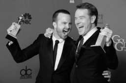 Actors Aaron Paul (L) and Bryan Cranston (R) celebrate winning Best Series - Drama for "Breaking Bad" in the press room during the 71st Annual Golden Globe Awards in Beverly Hills, California, January 12, 2014. ©AFP PHOTO / Robyn BECK