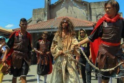 Penitents reenact the passion of Christ in the streets of Castillejos in Zambales on Good Friday. Filipinos trooped to the provinces during Holy Week celebrations as they take advantage of the four-day holiday break and weekend to observe traditional rituals practiced in their hometowns.(MNS photo)