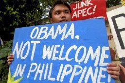 A student displays a placard protesting the scheduled arrival of US President Obama for the upcoming Asia Pacific Economic Cooperation meeting, in Manila on Thursday. The Philippines will be hosting the 2015 APEC Economic Leader’s meeting from November 17-20, wherein 21 world leaders are expected to attend.(MNS photo)