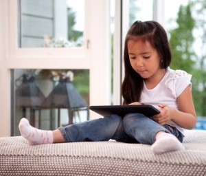 Tablets replacing TV, teachers and babysitters: Nielsen