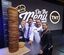 (L to R) Guinness World Records adjudicator Morgan Wilber, Ty Pennington, Chef Emeril Lagasse and Tricia Melton attend the TNT 'On The Menu' Times Square event at Times Square on October 2, 2014 in New York City. ©WireImage for Turner Networks