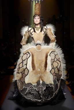Jean Paul Gaultier - Haute Couture - fall/winter 2015-2016 Gaultier's animal hide wedding gown features a skirt shaped like a crepe when seen from the front and completed the look with a tall headpiece inspired by the Breton look. ©P. Stable