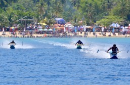 Fast and furious Bancarera racers at Sarbay in Gumasa, Sarangani (15 May 2015) - Federico Canoy of Maasim (center); Sam Bastida of Davao del Sur (right); and Joviro Veresraiz of Maasim (left) race in the finals of Bombo Radyo’s Bancarera: SarBay 2015 Edition Friday, May 15, ousting the other 45 banca racers from different regions of Mindanao. Canoy crossed the finish line first with an official time of 3:39:08 closely followed by Bastida (3:45:08). Web updates powered by SMART. (Russell Delvo for Sarangani Information Office)