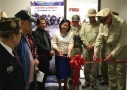 Consul General Ma. Hellen Barber De La Veda with Mr. Robert Tidwell as Gen. Douglas MacArthur at the ribbon-cutting ceremony launching the exhibit commemorating the 69th Anniversary of the Leyte Landing.