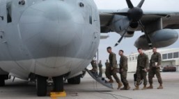 U.S. Marines board a KC-130J Hercules aircraft at Marine Corps Air Station Futenma, Okinawa, Japan, to depart for humanitarian assistance and disaster relief operations in the Philippines following Typhoon Haiyan, Nov. 11, 2013. The Marines are assigned to the 3rd Marine Expeditionary Force. U.S. Marine Corps photo by Lance Cpl. David N. Hersey