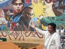 Mural creator Eliseo Art Silva talks about his artwork, which depicts Filipino and Fil-Am history and culture.