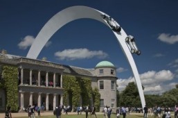 Mercedes-Benz cars arc through the sky at the Goodwood Festival of Speed