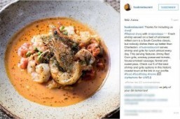 Fresh shrimp served on a bed of simmered milled corn, smoky preserved tomatoes, house-smoked sausage, fennel and sweet peas. ©2015 INSTAGRAM