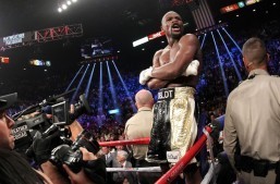 Floyd Mayweather, who won via a unanimous decision over Manny Pacquiao, shrugs off the jeers which greeted his victory over the Filipino champion and wasted no time in taunting his detractors. Photo: Chris Farina / Top Rank