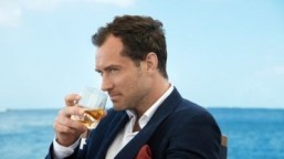 Jude Law dances in his latest role as spokesman for whisky