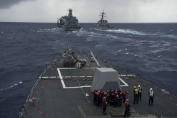 130918-N-TX154-114 PHILIPPINE SEA (Sept. 18, 2013) Sailors assigned to the Arleigh Burke-class guided-missile destroyer USS Preble (DDG 88) prepare for an underway replenishment (UNREP) with as USS Curtis Wilbur (DDG 54) conducts an UNREP with Military Sealift Command’s Fleet Replenishment Oiler USNS Yukon (T-AO2). Preble and Curtis Wilbur are on patrol with the George Washington Carrier Strike Group in the 7th Fleet area of operations supporting security and stability in the Indo-Asia-Pacific region. (U.S. Navy photo by Mass Communication Specialist 3rd Class Paul Kelly/Released)