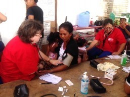 NRN members at work in evacuation center in Estancia. More than 2,000 have been forced from their homes.