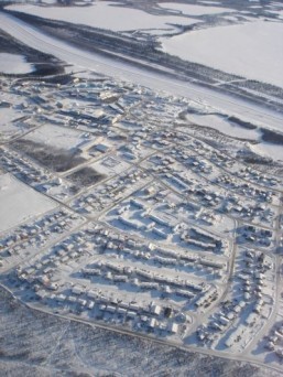 Aerial view of Inuvik, Northwest Territories The extension of the Dempster Highway, for which ground was broken this week, is to connect Inuvik to Tuktoyaktuk, a hamlet on the Arctic coast currently accessible only by winter ice road, barge or air. ©Max Lindenthaler/shutterstock.com
