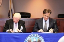 Ambassador Jose L. Cuisia, Jr. and NLRB General Counsel Richard Griffin sign the Memorandum of Understanding between the Office of the General Counsel of the NLRB and the DFA at a ceremony held at the NLRB Board Hearing Room on Wednesday, 22 October 2014. The MOU is aimed at educating Filipino workers and business owners on their rights to freedom of association and collective bargaining, as provided under the National Labor Relations Act, which is the basic US law governing labor relations. (Photo by the National Labor Relations Board)