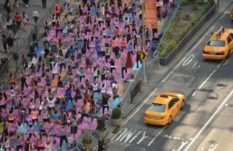 Thousands of yoga fans take over Times Square