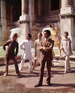 "The Glamour of Italian Fashion": Valentino posing with models nearby Trevi Fountain. Rome, July 1967 ©Victoria and Albert Museum, London. Courtesy of The Art Archive / Mondadori Portfolio / Marisa Rastellini
